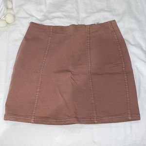 Blush colored mini pencil skirt.